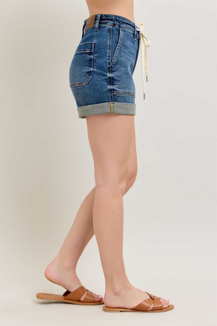 Judy Blue High Rise Cuff Denim ShortsHigh Rise Cuff Denim Shorts are a stylish and versatile wardrobe essential that offers a chic and casual look. These shorts feature a high-rise waist, sitting at or Jean ShortsJudy Blue High Rise