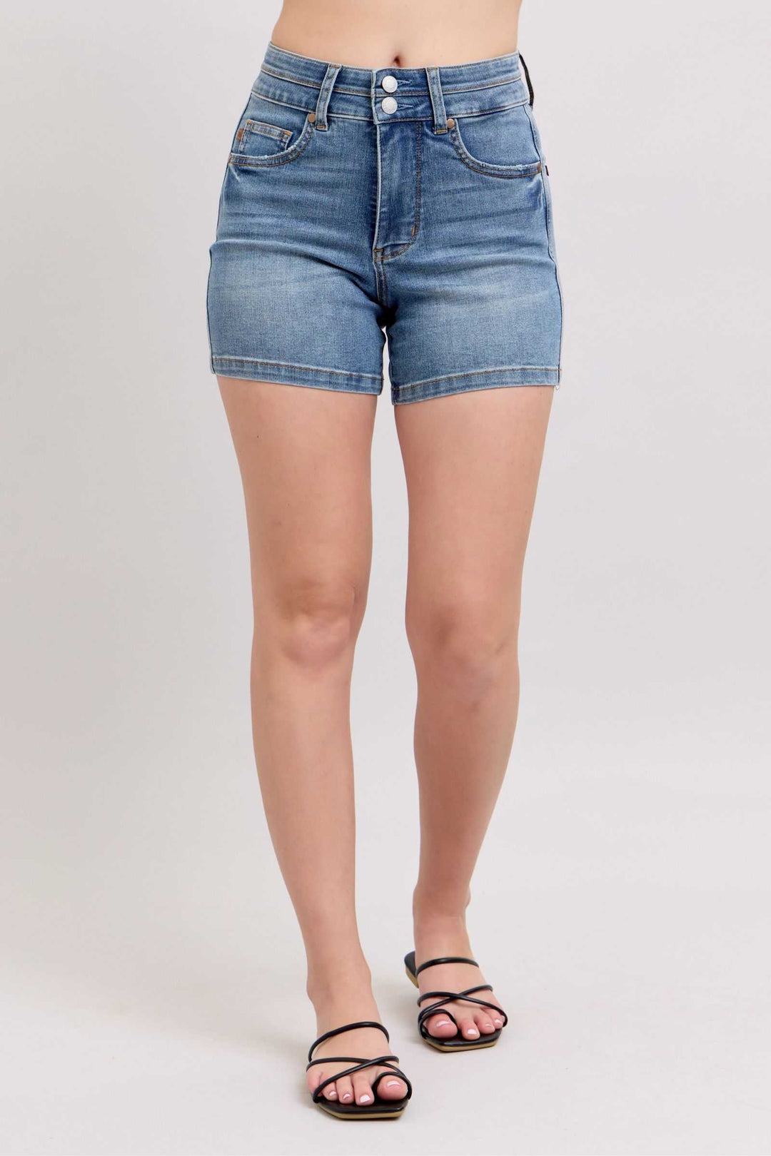 Judy Blue High Rise Tummy Control Denim ShortsHigh Rise Tummy Control Denim Shorts are a fashionable and flattering option for those looking for a slimming and comfortable fit. These shorts feature a high-rise wJean ShortsJudy Blue High Rise