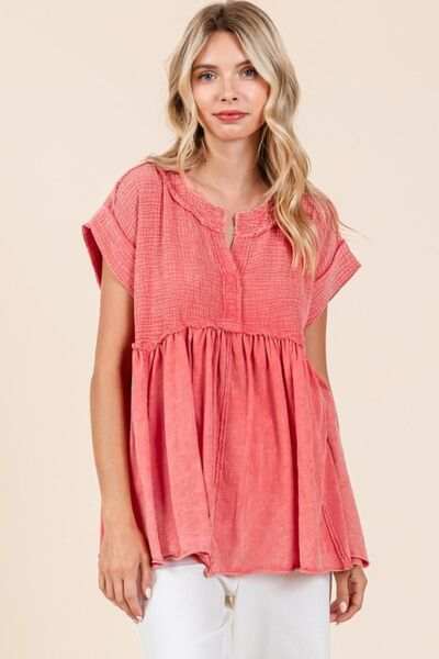 Mineral Wash Cotton Babydoll Short Sleeve BlouseThis relaxed fit tunic top is crafted from a unique 100% cotton waffle knit fabric with a mineral wash finish for a laid-back and stylish look. Featuring a flatterinShort Sleeve BlousesMineral Wash Cotton