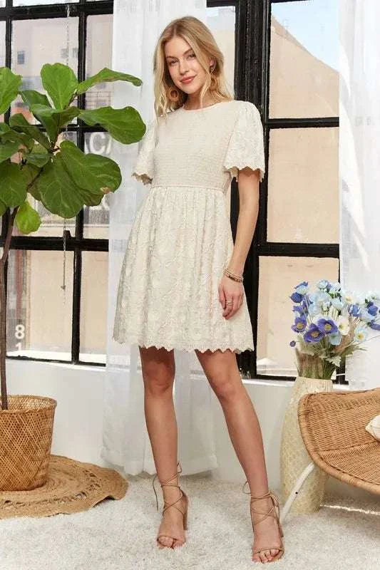 ADORA Rround Neck Crinkle Babydoll DressThe round neck crinkle babydoll dress is a charming and feminine option for any day. Its relaxed silhouette and crinkled texture add a playful touch to your outfit. ADORA Rround Neck