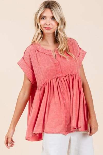 Mineral Wash Cotton Babydoll Short Sleeve BlouseThis relaxed fit tunic top is crafted from a unique 100% cotton waffle knit fabric with a mineral wash finish for a laid-back and stylish look. Featuring a flatterinShort Sleeve BlousesMineral Wash Cotton