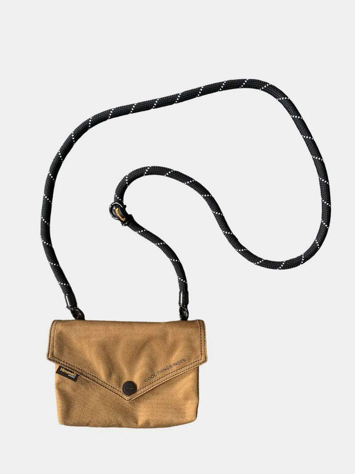 Himawari Solid Color Envelope Shape Crossbody Bag with Removable StrapThe solid color envelope shape crossbody bag with removable strap is a versatile and stylish accessory for any outfit. Its sleek design and solid color make it efforCrossbody BagsHimawari Solid Color Envelope