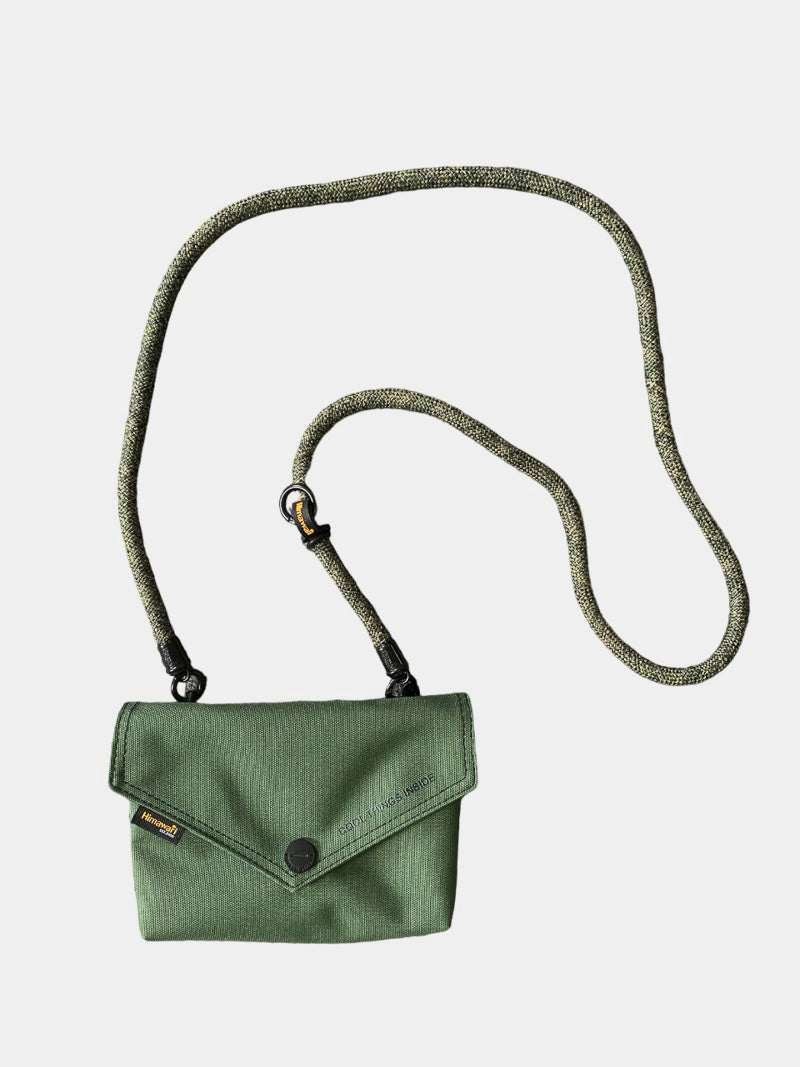 Himawari Solid Color Envelope Shape Crossbody Bag with Removable StrapThe solid color envelope shape crossbody bag with removable strap is a versatile and stylish accessory for any outfit. Its sleek design and solid color make it efforCrossbody BagsHimawari Solid Color Envelope