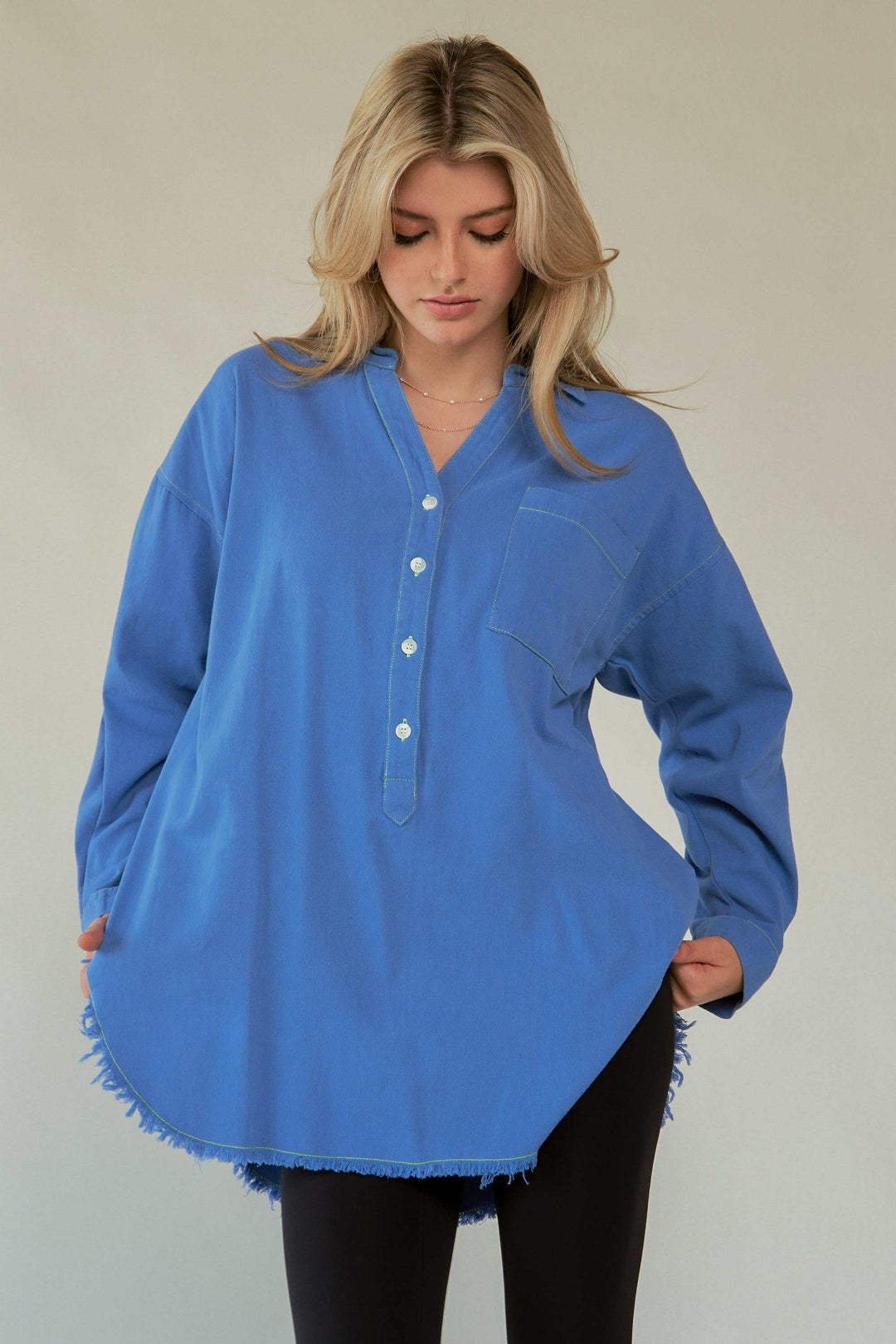 Amor Oversized ShirtLove in every stitch. This oversized 100% cotton button-up shirt features a bold "AMOR" appliqué across the back in plush lettering, adding a playful statement to yoButton-Up ShirtsAmor Oversized Shirt