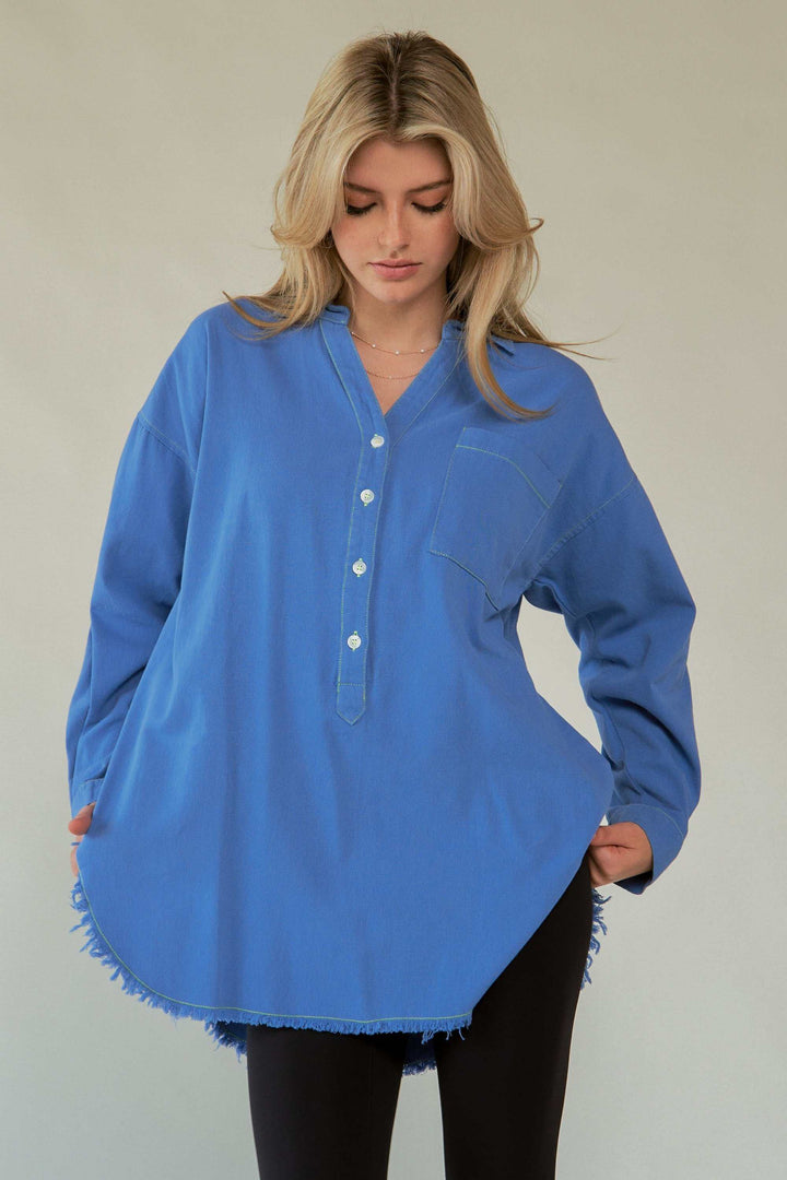 Amor Oversized ShirtLove in every stitch. This oversized 100% cotton button-up shirt features a bold "AMOR" appliqué across the back in plush lettering, adding a playful statement to yoButton-Up ShirtsAmor Oversized Shirt
