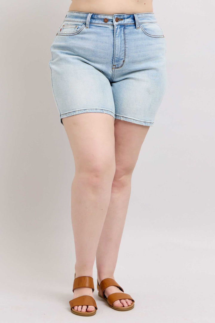 Judy Blue Two Button Denim ShortsThese 2-button denim shorts are a stylish addition to your wardrobe. They feature pockets for your convenience and added functionality. Made from durable denim fabriJean ShortsJudy Blue Two Button Denim Shorts