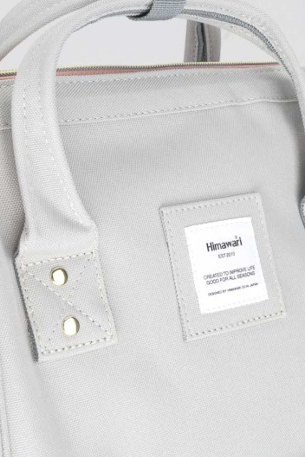 Himawari Contrast Waterproof Canvas Backpack Bag with Side PocketsThe Contrast Waterproof Canvas Backpack Bag with Side Pockets is a modern take on traditional outdoor gear. With its contemporary design and vibrant color accents, tBackpackHimawari Contrast Waterproof