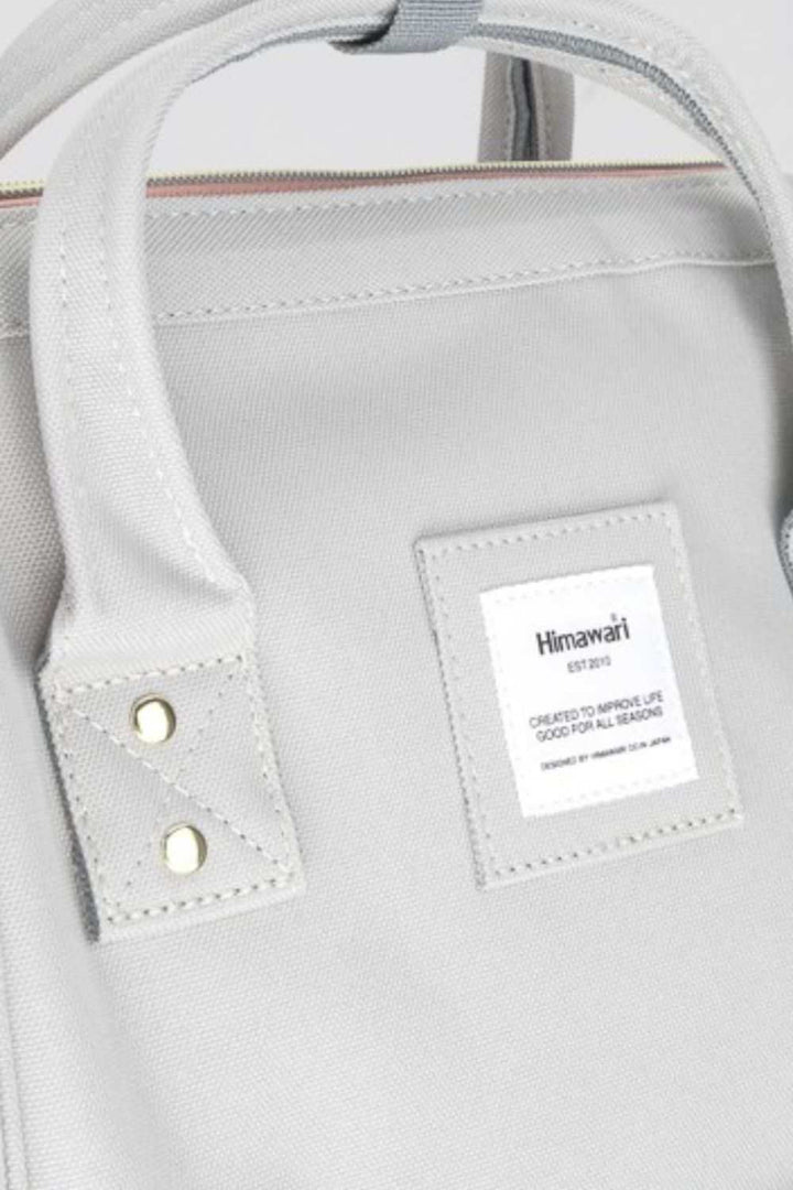 Himawari Contrast Waterproof Canvas Backpack Bag with Side PocketsThe Contrast Waterproof Canvas Backpack Bag with Side Pockets is a modern take on traditional outdoor gear. With its contemporary design and vibrant color accents, tBackpackHimawari Contrast Waterproof