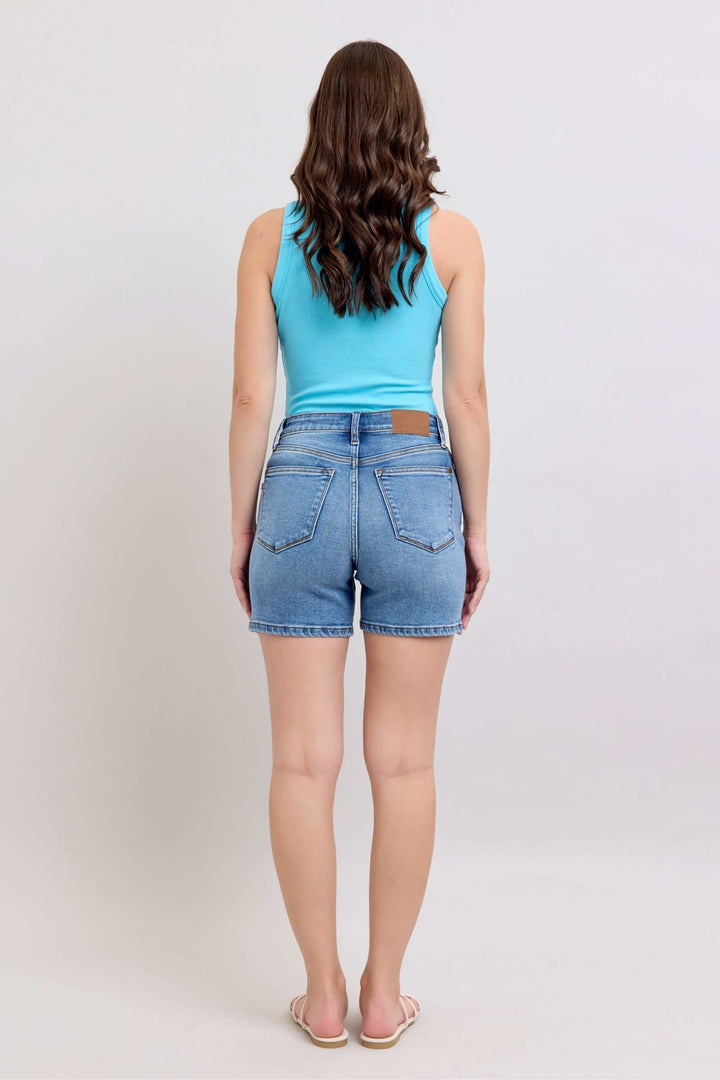 Judy Blue Two Button Denim ShortsElevate your casual look with our 2-button denim shorts featuring convenient pockets for on-the-go essentials. These shorts offer a stylish and comfortable fit, perfJean ShortsJudy Blue Two Button Denim Shorts
