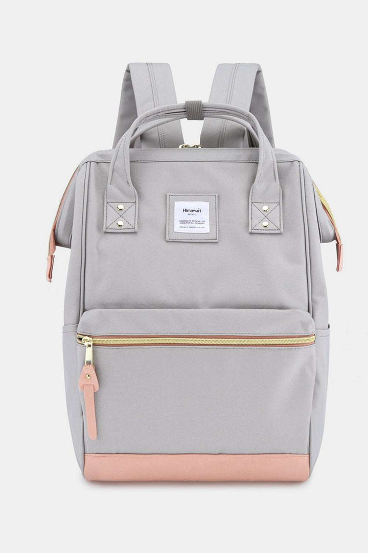 Himawari Contrast Waterproof Canvas Backpack Bag with Side PocketsThe Contrast Waterproof Canvas Backpack Bag with Side Pockets is a modern take on traditional outdoor gear. With its contemporary design and vibrant color accents, tBackpackHimawari Contrast Waterproof