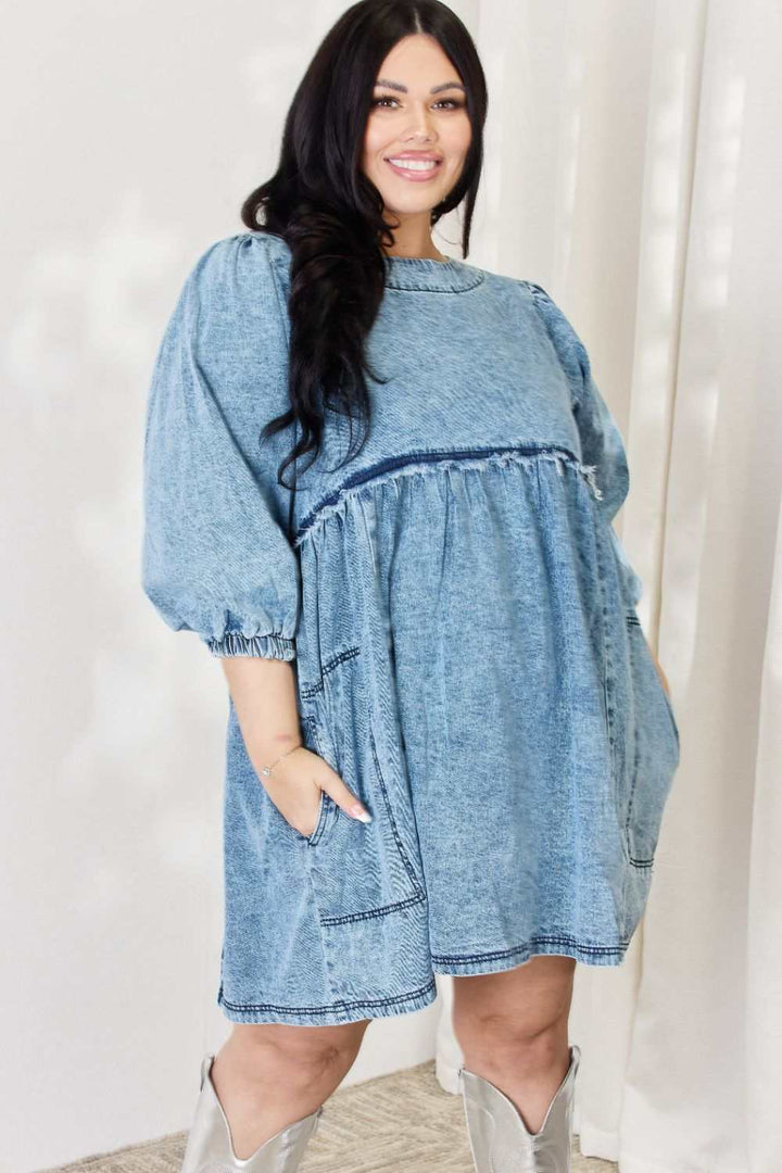 Oversized Denim Babydoll DressThis dress boasts a relaxed, oversized fit that flatters all body types. The babydoll silhouette adds a touch of playful femininity, while the balloon sleeves exude Mini DressesOversized Denim Babydoll Dress