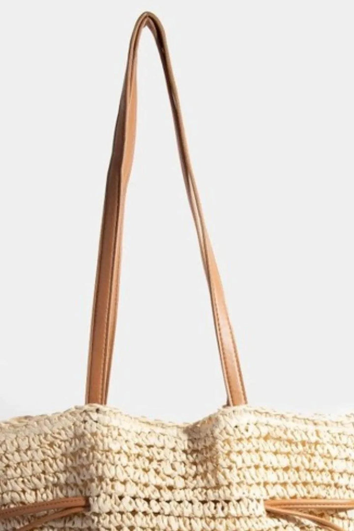 Fame Faux Leather Straps Braided Tote BagThis faux leather straps braided tote bag is a sophisticated and stylish accessory that adds a touch of elegance to any ensemble. The combination of faux leather andTote BagsFame Faux Leather