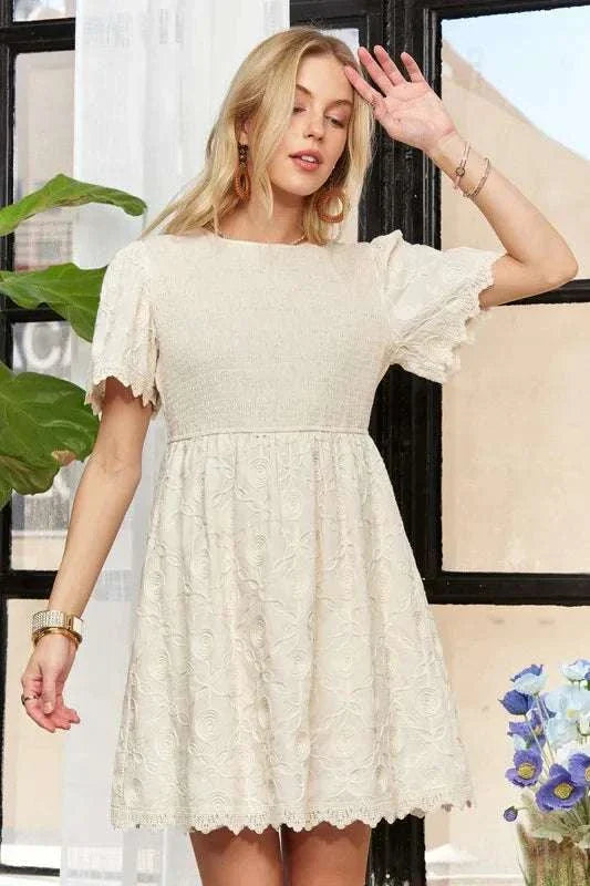 ADORA Rround Neck Crinkle Babydoll DressThe round neck crinkle babydoll dress is a charming and feminine option for any day. Its relaxed silhouette and crinkled texture add a playful touch to your outfit. ADORA Rround Neck