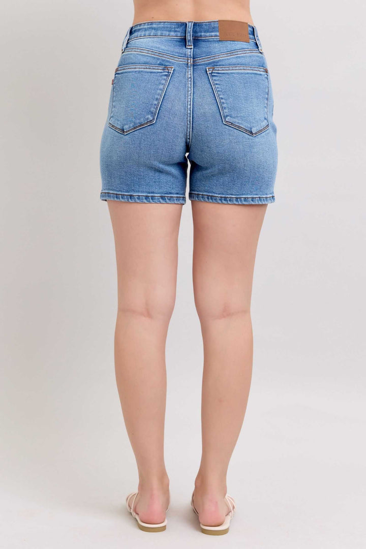 Judy Blue Two Button Denim ShortsElevate your casual look with our 2-button denim shorts featuring convenient pockets for on-the-go essentials. These shorts offer a stylish and comfortable fit, perfJean ShortsJudy Blue Two Button Denim Shorts