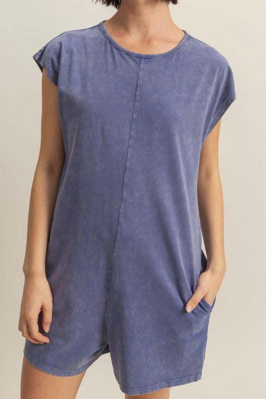 Relaxed Fit Breezy RomperThe Round Neck Cap Sleeve Relaxed Fit Breezy Romper is a stylish and comfortable one-piece outfit perfect for warm weather. Featuring a round neck and cap sleeves, tRompersRelaxed Fit Breezy Romper