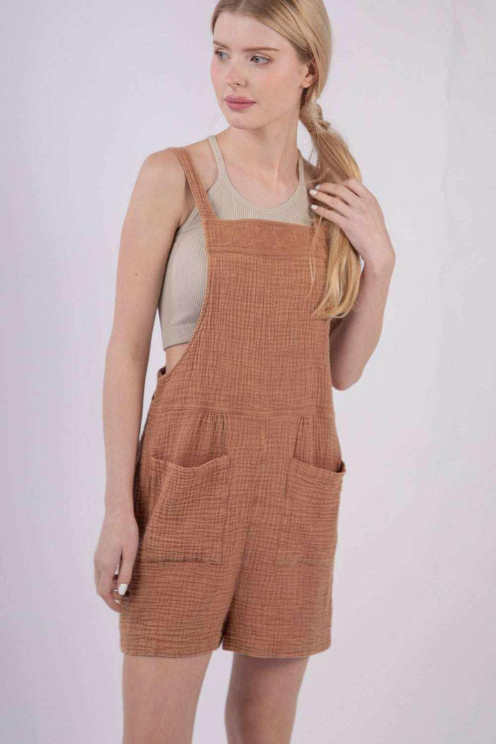 Burnt Sienna Double Gauze Overall ShortsKeep cool and comfy with these overall shorts made from summer-friendly double gauze cotton. With a square neckline and open back, these overall shorts adds a stylisOverallsBurnt Sienna Double Gauze