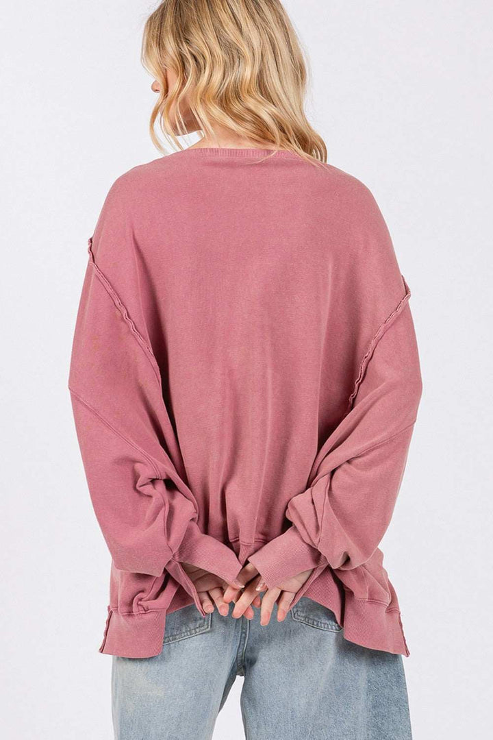 Cotton Mineral Wash Side Slit Oversized SweatshirtThe 100% cotton Mineral Wash Side Slit Oversized Sweatshirt is a comfortable and stylish choice for casual wear. Made from a soft fabrication, this sweatshirt offersSweatshirtsCotton Mineral Wash