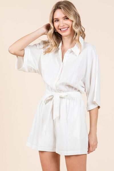 Tie Waist Linen Blend Half Sleeve RomperThe Tie Waist Linen Blend Half Sleeve Romper is a stylish and versatile one-piece outfit that exudes casual elegance. With a tie waist detail and half sleeves, this RompersTie Waist Linen Blend