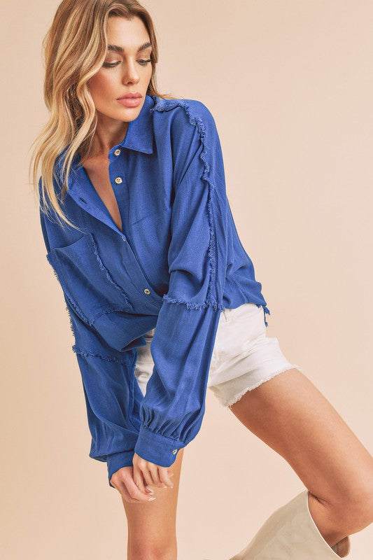 Frayed Edge Cotton Button-Up ShirtSoftly relaxed with just enough texture, the Frayed Edge Cotton Button-Up is made for effortless layering. Crafted from 100% cotton, this shirt features raw edge detButton-Up ShirtsFrayed Edge Cotton