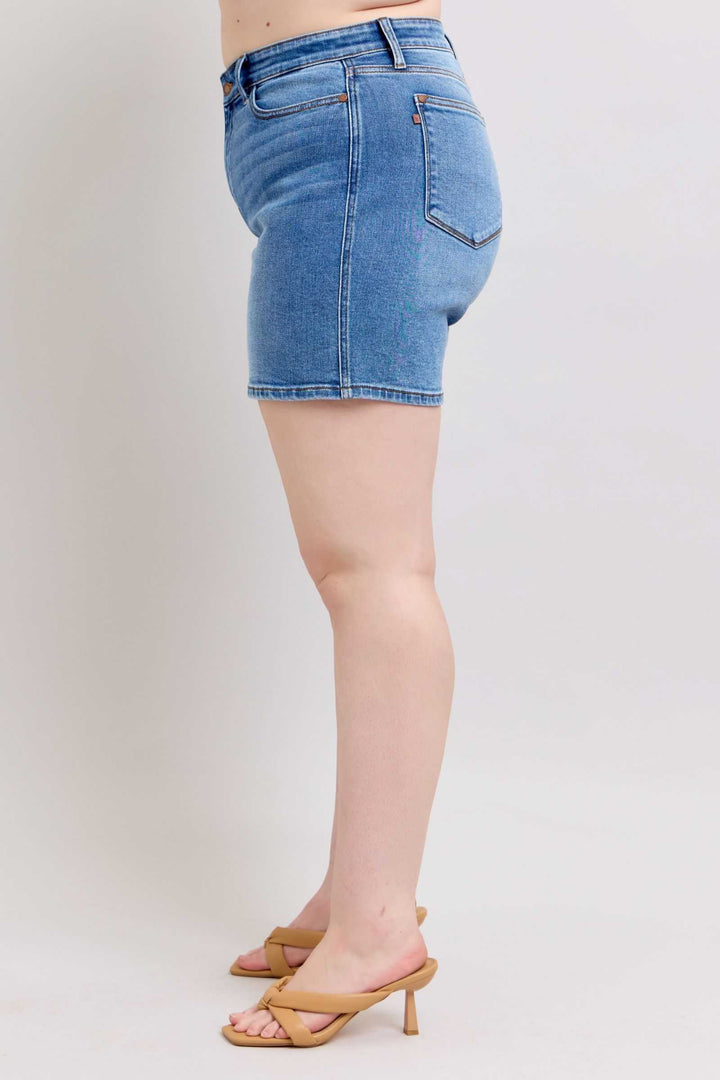 Judy Blue Two Button Denim ShortsElevate your casual look with our 2-button denim shorts featuring convenient pockets for on-the-go essentials. These shorts offer a stylish and comfortable fit, perfJean ShortsJudy Blue Two Button Denim Shorts