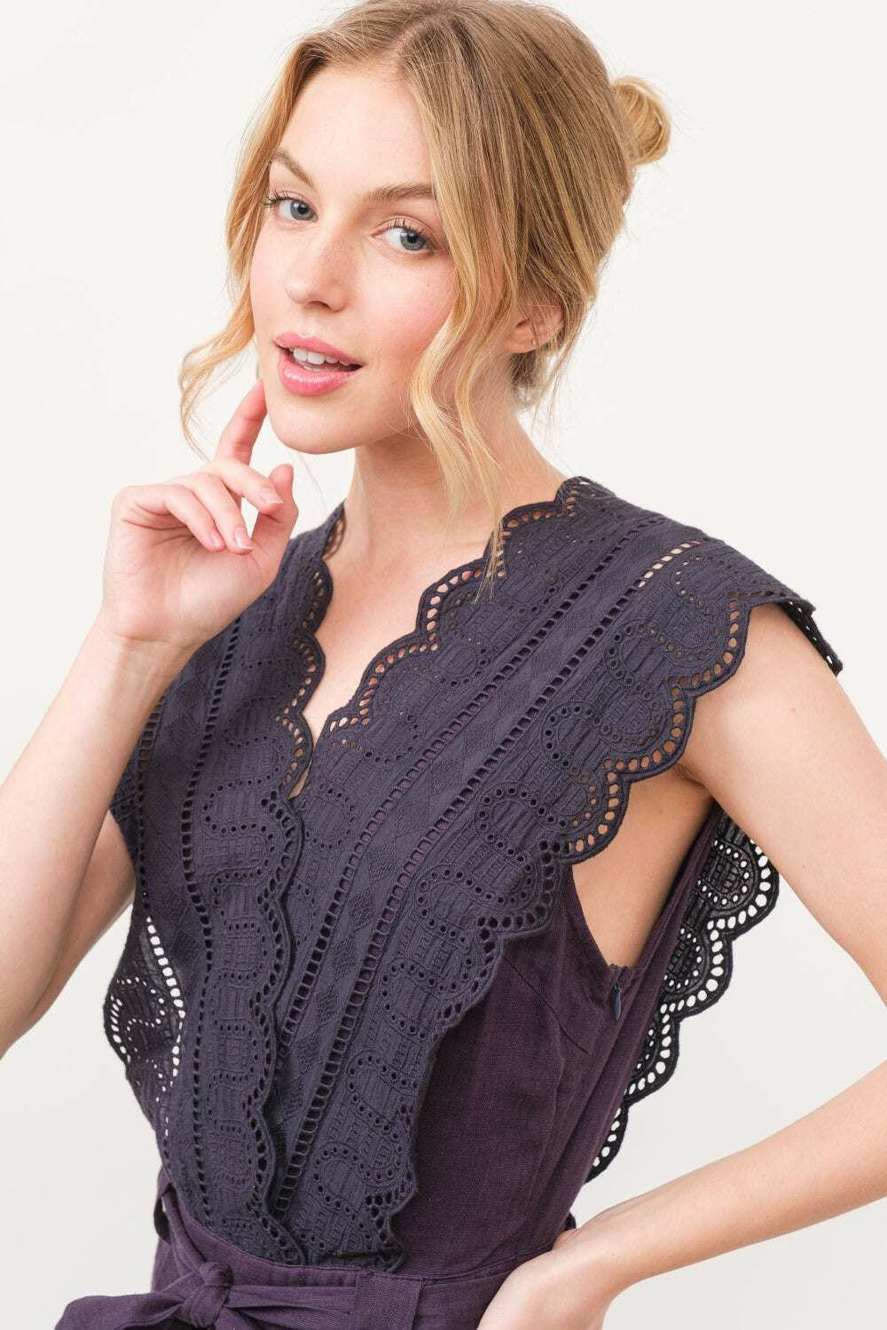 Plum Elegance Lace JumpsuitThe Plum Elegance Lace Jumpsuit is a chic and sophisticated piece that combines elegance with modern style. Featuring a laced surplice neckline and a flattering tie JumpsuitsPlum Elegance Lace Jumpsuit