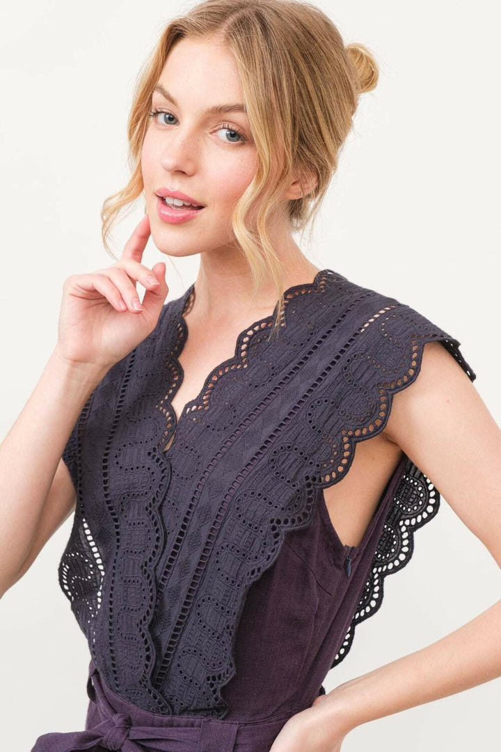 Plum Elegance Lace JumpsuitThe Plum Elegance Lace Jumpsuit is a chic and sophisticated piece that combines elegance with modern style. Featuring a laced surplice neckline and a flattering tie JumpsuitsPlum Elegance Lace Jumpsuit