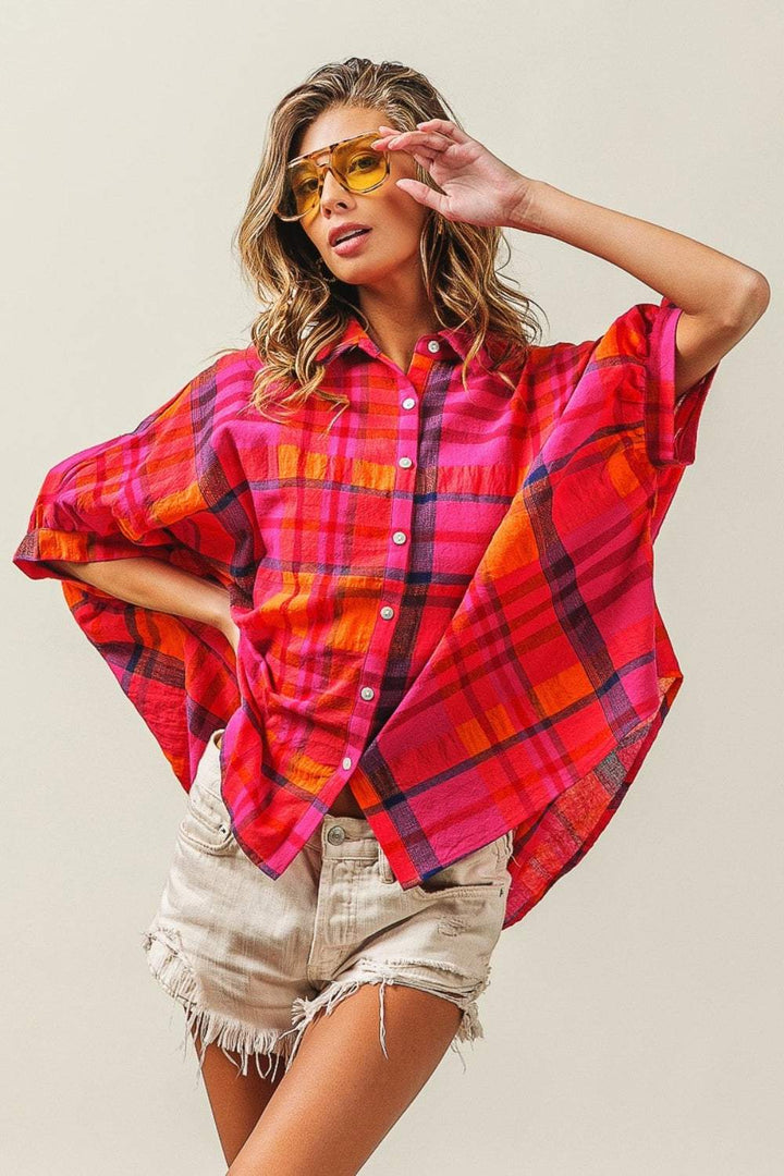 Linen Blend Dolman Sleeve Plaid ShirtThe Linen Blend Dolman Sleeve Plaid Shirt is a versatile and trendy wardrobe staple. This shirt features a classic plaid pattern that never goes out of style. The doButton-Up ShirtsLinen Blend Dolman Sleeve