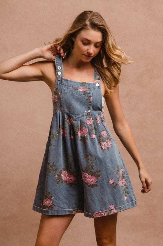 Heirloom Floral OverallsTimeless and effortlessly charming, The Heirloom Floral Overalls blend vintage elegance with casual ease. Crafted from sturdy yet soft cotton denim, these overalls fOverallsHeirloom Floral Overalls