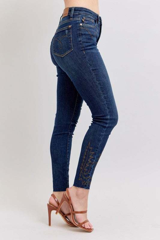 Judy Blue Embroidered High Rise Skinny JeansEmbroidered High Rise Skinny Jeans are a stylish and on-trend addition to any wardrobe. These jeans feature intricate and eye-catching embroidery details that add a Skinny JeansJudy Blue Embroidered High Rise Skinny Jeans