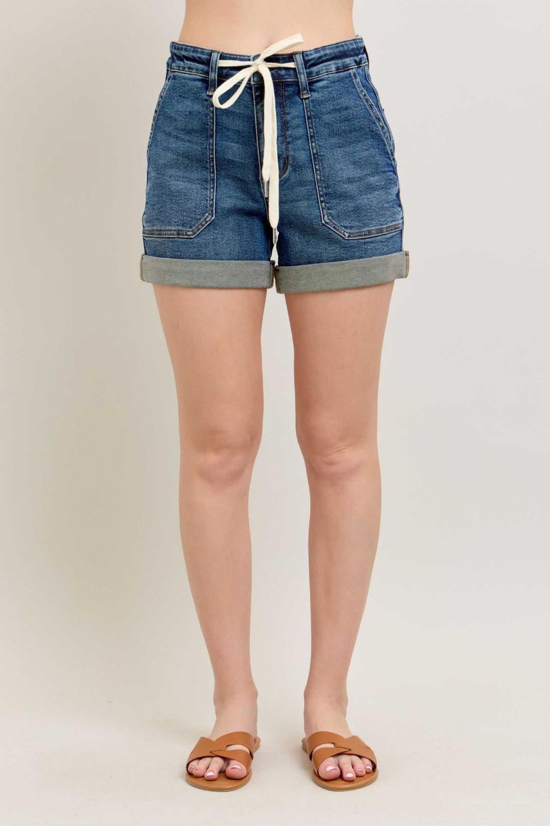 Judy Blue High Rise Cuff Denim ShortsHigh Rise Cuff Denim Shorts are a stylish and versatile wardrobe essential that offers a chic and casual look. These shorts feature a high-rise waist, sitting at or Jean ShortsJudy Blue High Rise