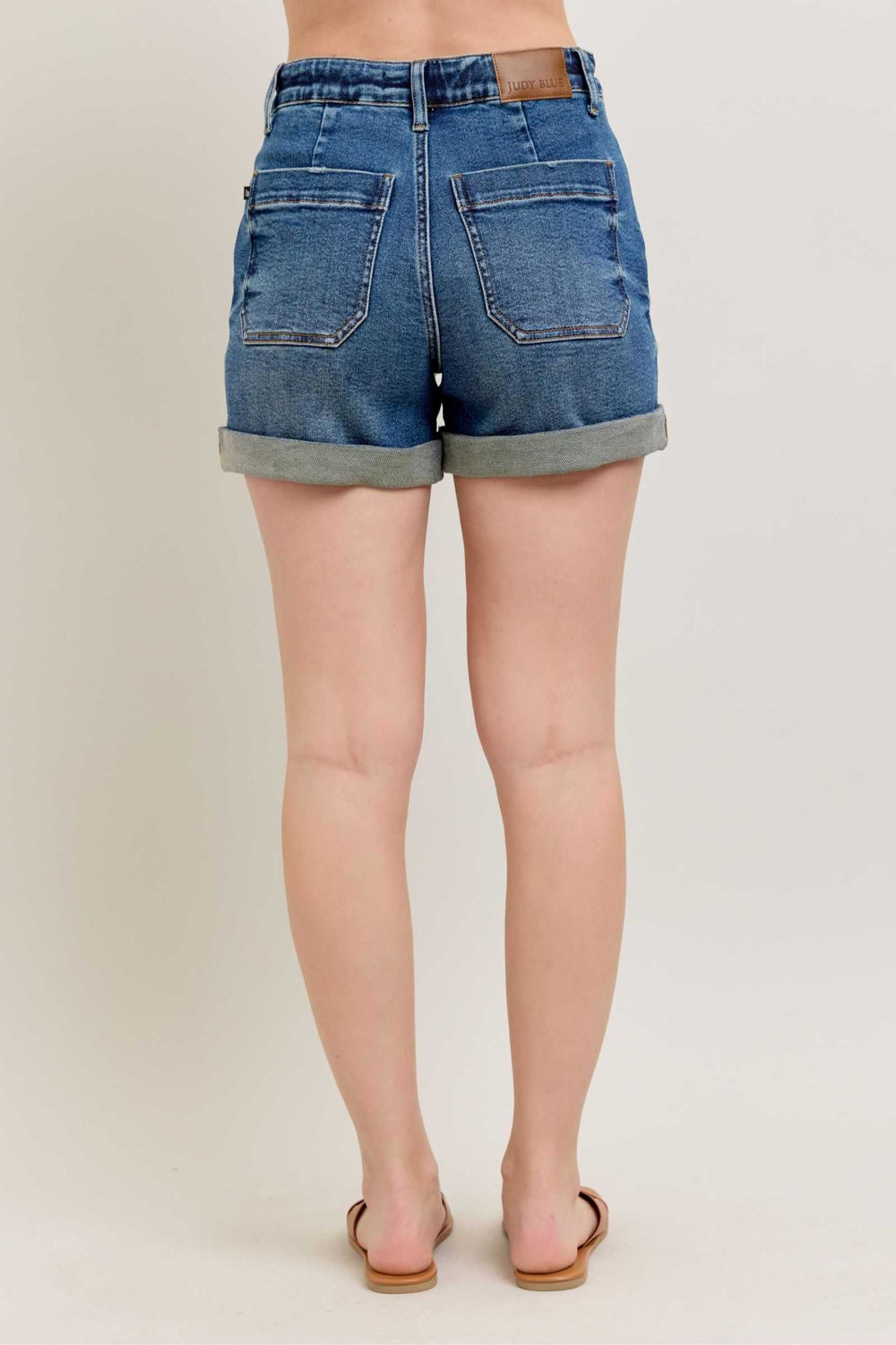Judy Blue High Rise Cuff Denim ShortsHigh Rise Cuff Denim Shorts are a stylish and versatile wardrobe essential that offers a chic and casual look. These shorts feature a high-rise waist, sitting at or Jean ShortsJudy Blue High Rise