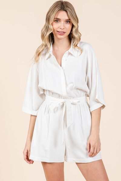 Tie Waist Linen Blend Half Sleeve RomperThe Tie Waist Linen Blend Half Sleeve Romper is a stylish and versatile one-piece outfit that exudes casual elegance. With a tie waist detail and half sleeves, this RompersTie Waist Linen Blend