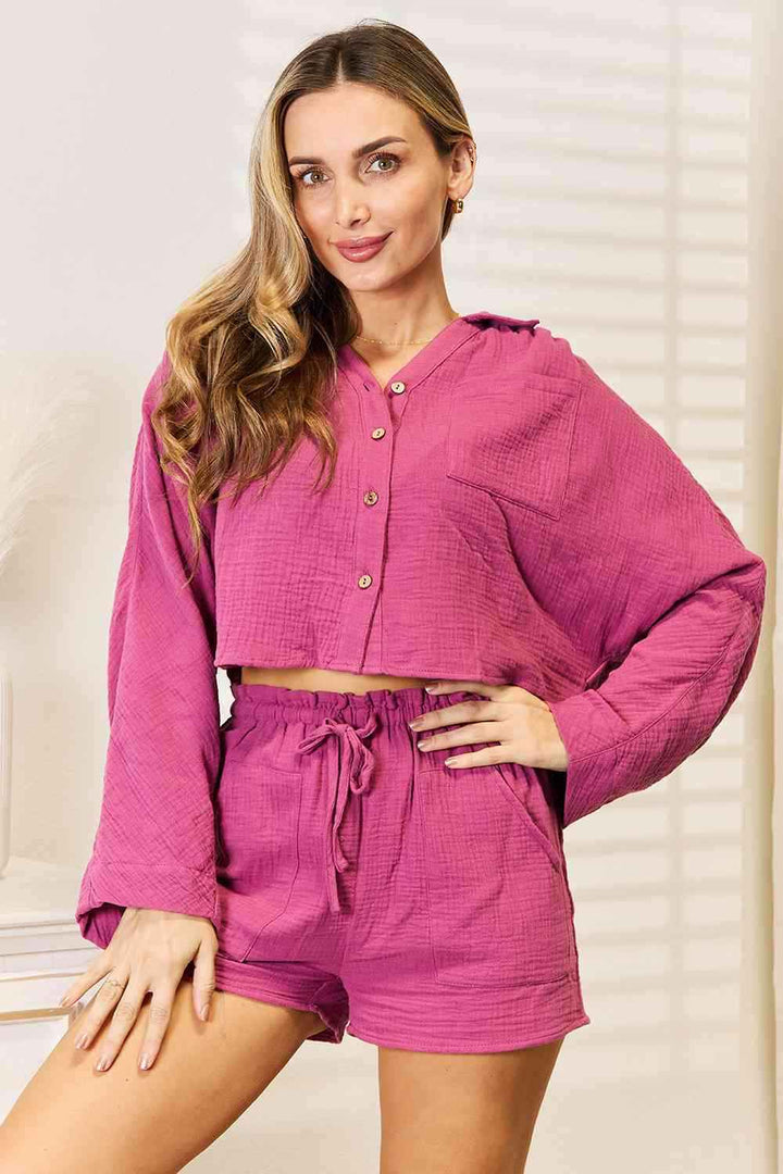 Buttoned Long Sleeve Top and Shorts SetComplete your summer wardrobe with this stylish buttoned long-sleeve top and shorts set. The top features a button front and long sleeves, while the shorts are craftTwo Piece SetsButtoned Long Sleeve Top