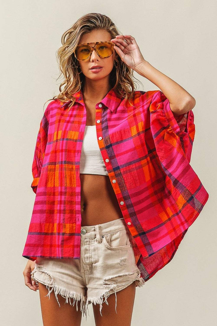 Linen Blend Dolman Sleeve Plaid ShirtThe Linen Blend Dolman Sleeve Plaid Shirt is a versatile and trendy wardrobe staple. This shirt features a classic plaid pattern that never goes out of style. The doButton-Up ShirtsLinen Blend Dolman Sleeve