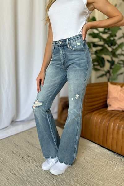 Judy Blue Medium Rise Tummy Control Destroyed FlareThe medium rise tummy control destroy flare jeans are designed to enhance your silhouette while providing ultimate comfort. Featuring a flattering fit, these jeans oFlare JeansJudy Blue Medium Rise