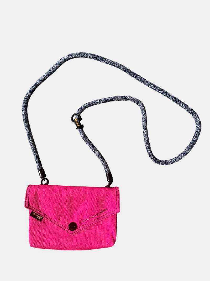 Himawari Solid Color Envelope Shape Crossbody Bag with Removable StrapThe solid color envelope shape crossbody bag with removable strap is a versatile and stylish accessory for any outfit. Its sleek design and solid color make it efforCrossbody BagsHimawari Solid Color Envelope