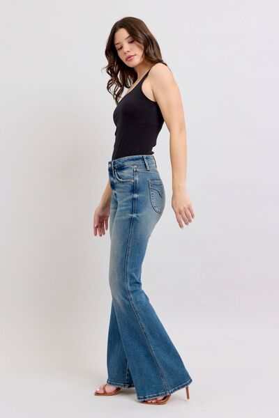Judy Blue Flared Tummy Control Vintage Wash Flare JeansThese flared tummy control vintage wash jeans offer both style and functionality. The tummy control feature helps create a flattering and slimming silhouette. The viFlare JeansJudy Blue Flared Tummy Control