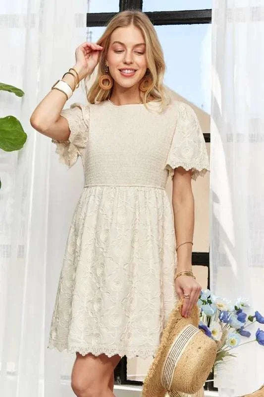 ADORA Rround Neck Crinkle Babydoll DressThe round neck crinkle babydoll dress is a charming and feminine option for any day. Its relaxed silhouette and crinkled texture add a playful touch to your outfit. ADORA Rround Neck