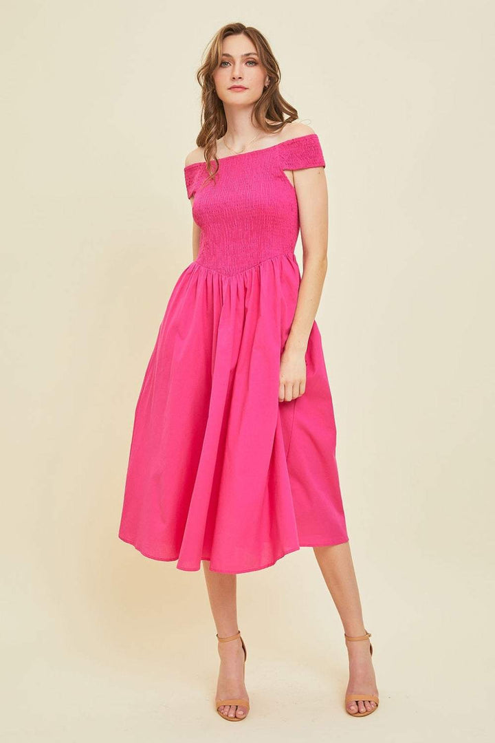 Off-Shoulder Smocked Midi DressThe 100% cotton Off-Shoulder Smocked Midi Dress is a stylish and versatile piece that is perfect for warm weather. Featuring an off-shoulder design and a smocked bodMidi DressesOff-Shoulder Smocked Midi Dress