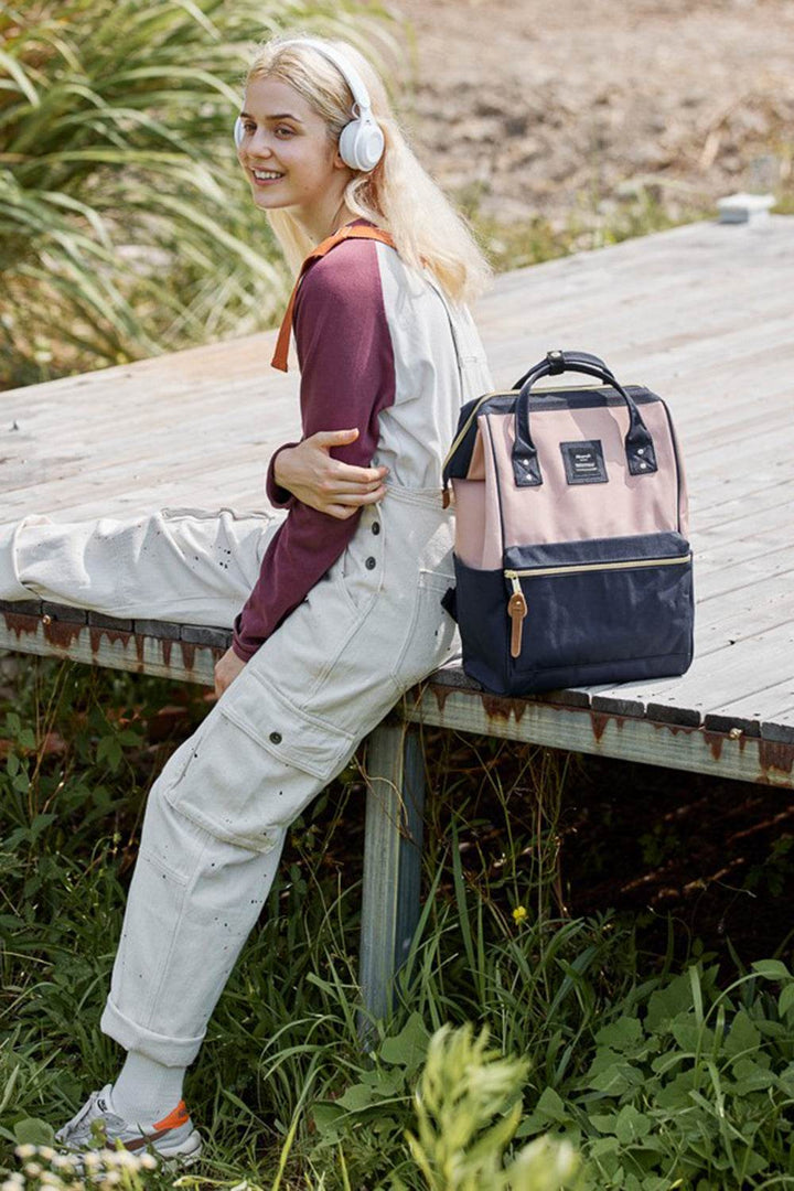 Himawari Waterproof Canvas Backpack Bag with Side PocketsIntroducing the upgraded version of the Holly, the Holly Daze backpack, now with a padded laptop compartment. This minimalist and classic Japanese-style backpack feaBackpackHimawari Waterproof Canvas Backpack