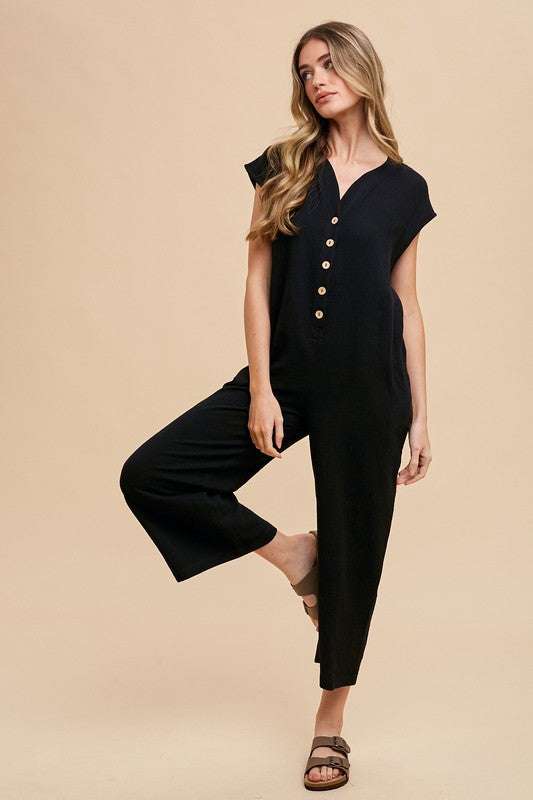 Cotton Wide Leg JumpsuitThe Cotton Wide Leg Jumpsuit with Pockets is a stylish and versatile garment that offers both comfort and chic style. This jumpsuit features button detailing that adJumpsuitsCotton Wide Leg Jumpsuit