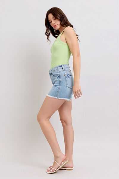 Judy Blue Tummy Control Raw Hem Denim ShortsThe tummy control raw hem denim shorts are designed to provide a slimming effect around the waist area while also featuring a trendy raw hem finish at the bottom. ThJean ShortsJudy Blue Tummy Control