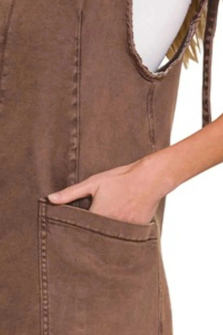 Washed Adjustable Strap Denim Overall DressThis stylish denim dress features a soft coffee washed denim construction with a relaxed, comfortable fit. The deep V-neckline and sleeveless design make it perfect Mini DressesWashed Adjustable Strap