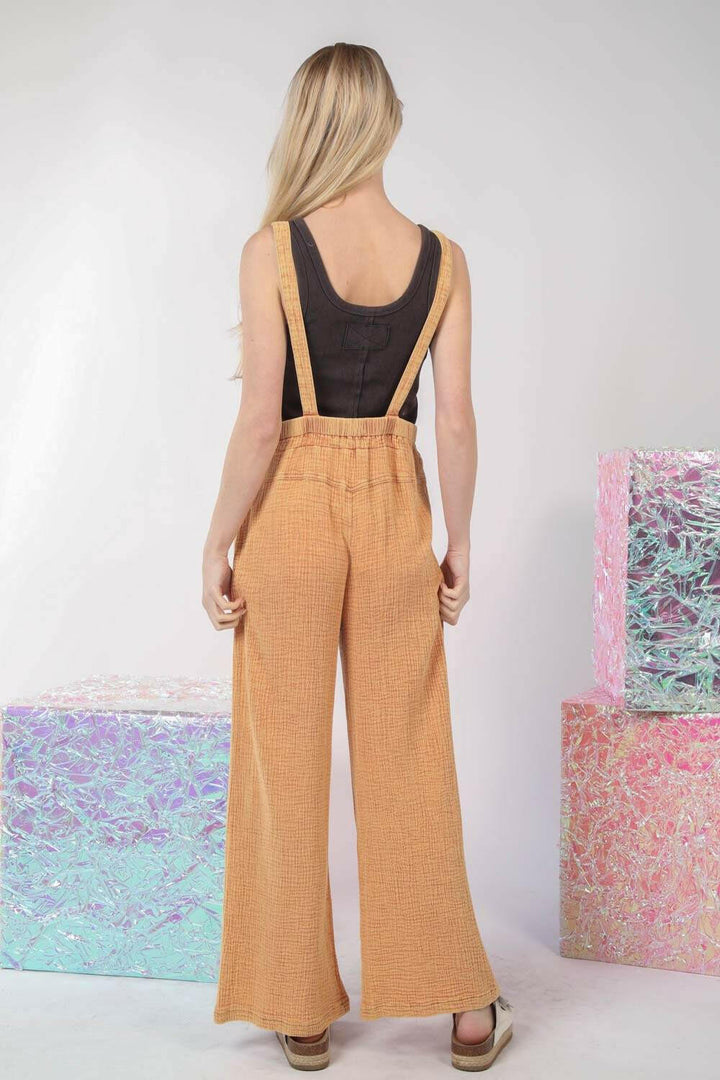 Textured Cotton Overalls - TangerineStep into sunny days with our Tangerine Cotton Overalls. This vibrant piece is designed with a relaxed, wide-leg fit and a classic square neckline, making it perfectOverallsTextured Cotton Overalls