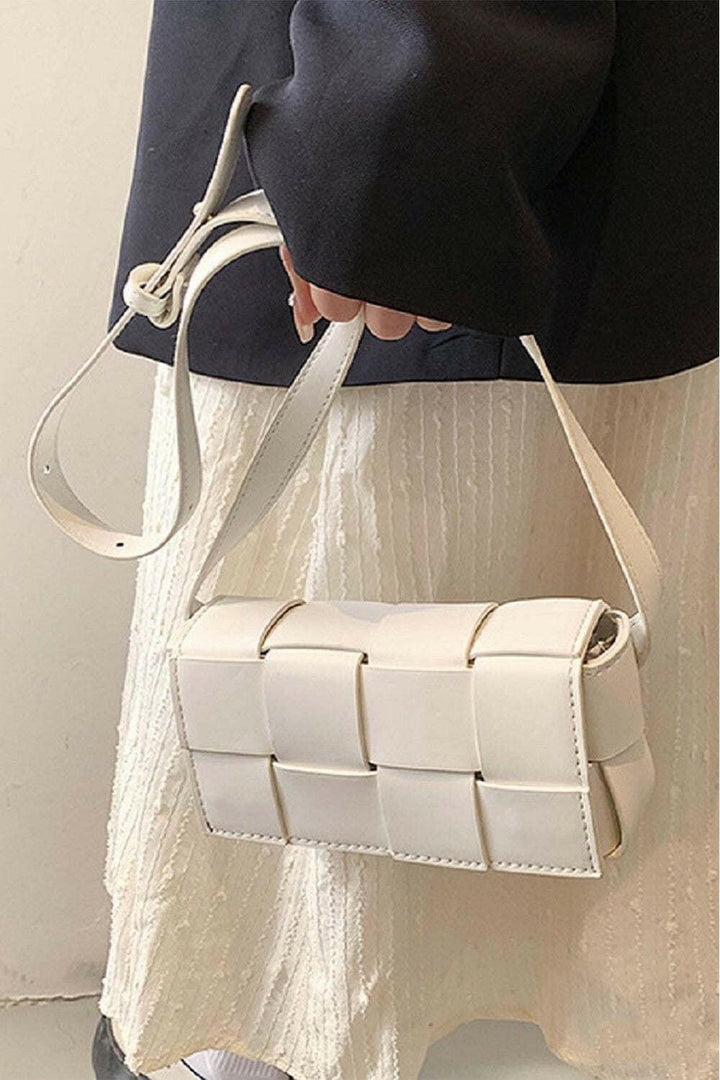 Woven Crossbody BagThis crossbody bag is the ultimate blend of style and practicality - ideal for any occasion, whether it's a casual day out or a fancy event, and will effortlessly elCrossbody BagsWoven Crossbody Bag