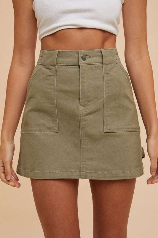 Cargo Denim Mini SkirtA cargo denim mini skirt combines the edgy style of cargo pants with the classic silhouette of a mini skirt, creating a trendy and versatile piece. The cargo pocketsMini SkirtsCargo Denim Mini Skirt