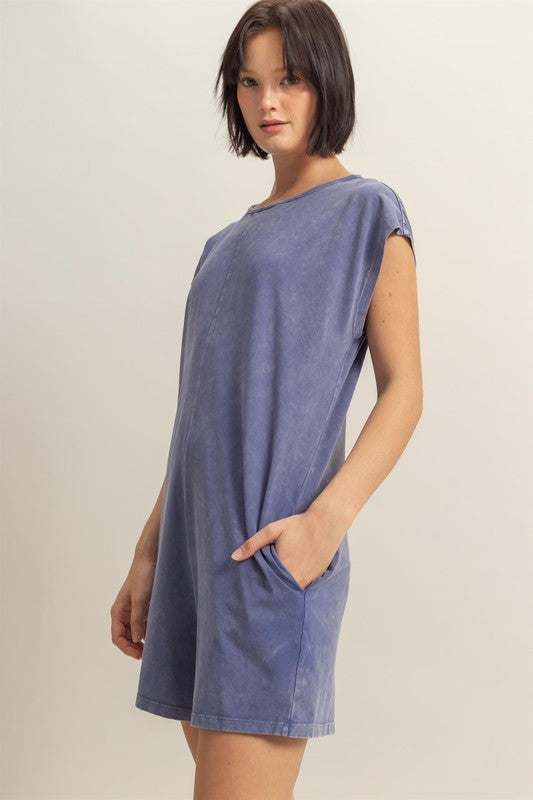 Relaxed Fit Breezy RomperThe Round Neck Cap Sleeve Relaxed Fit Breezy Romper is a stylish and comfortable one-piece outfit perfect for warm weather. Featuring a round neck and cap sleeves, tRompersRelaxed Fit Breezy Romper