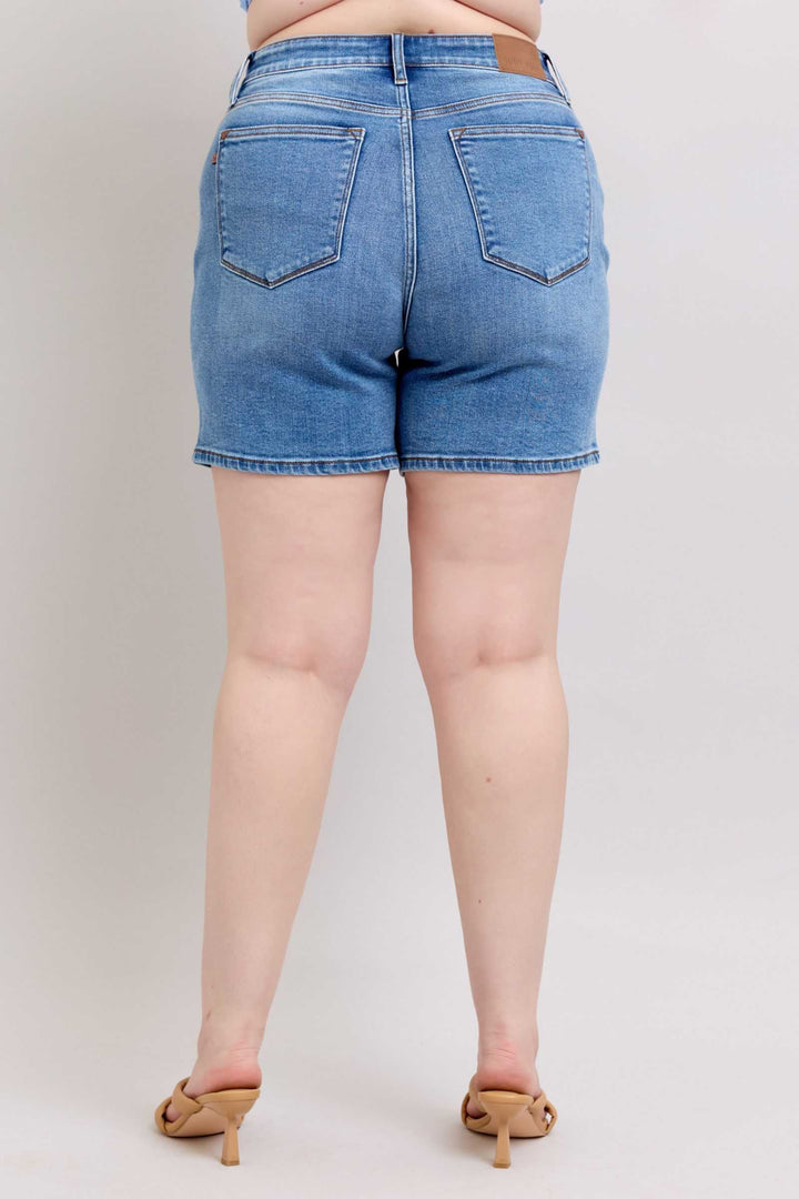 Judy Blue Two Button Denim ShortsElevate your casual look with our 2-button denim shorts featuring convenient pockets for on-the-go essentials. These shorts offer a stylish and comfortable fit, perfJean ShortsJudy Blue Two Button Denim Shorts