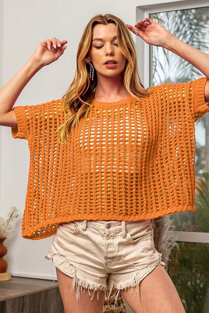 Openwork Knit TopStay stylish and chic with this 100% cotton Openwork Knit Top, perfect for layering over your outfits for a touch of elegance. The openwork design adds a trendy and Open Weave TopsOpenwork Knit Top
