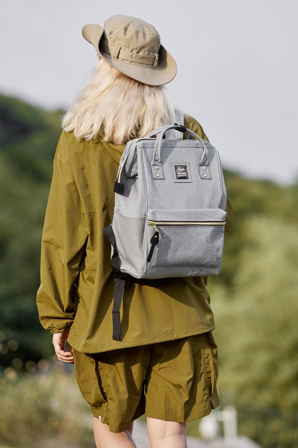 Himawari Waterproof Canvas Backpack Bag with Side PocketsIntroducing the upgraded version of the Holly, the Holly Daze backpack, now with a padded laptop compartment. This minimalist and classic Japanese-style backpack feaBackpackHimawari Waterproof Canvas Backpack